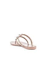 Valentino Garavani Summer Rockstud PVC Thong Sandal in Poudre, view 3, click to view large image.