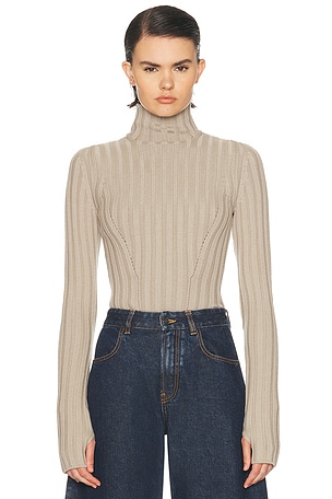 ALAÏA Corset Bodysuit in Beige