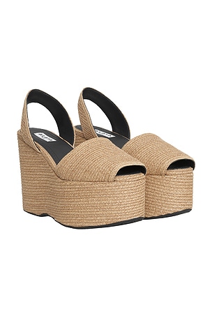 ALAÏA ALAΪA Slingback Wedge in Beige