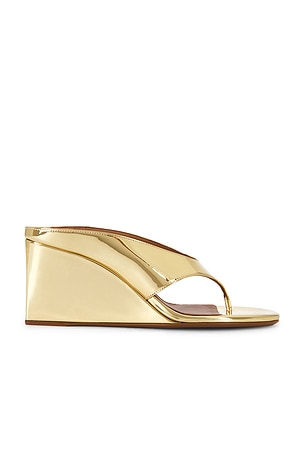 ALAÏA Wedge Thong Mule in Metallic Gold