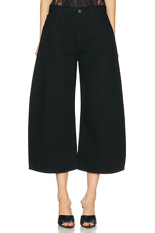 THE ATTICO Curved Short Leg in Black