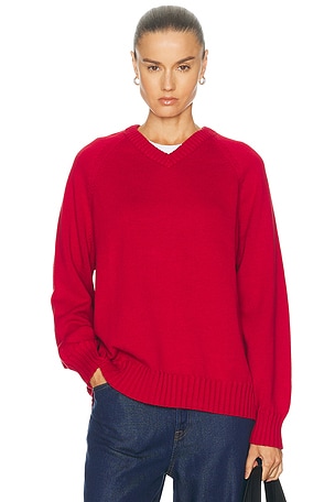 DONNI. The Cotton Knit V Neck Sweater in Red
