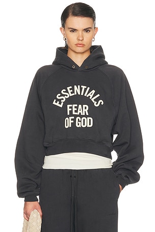 Fear of God ESSENTIALS Campus 90's Cropped Raglan Fleece Hoodie in Black