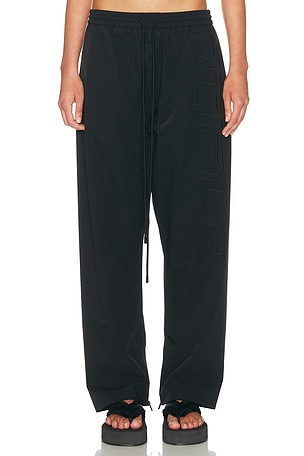 Fear of God ESSENTIALS Active Trace Track Sporty Nylon Pant in Black
