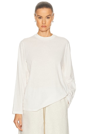 Fear of God ESSENTIALS Classic Fit Long Sleeve Tee in Ivory