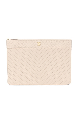 Chanel Caviar O Case Clutch in Beige
