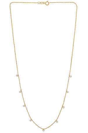 STONE AND STRAND Teeny Dangling Diamond Bead Chain Necklace in Metallic Gold