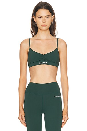 Sporty & Rich Serif Logo Mini Sports Bra in Dark Green
