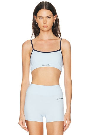 Sporty & Rich Signature Logo Sports Bra in Baby Blue