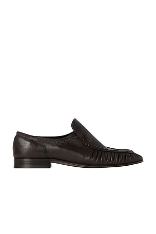 The Row Soft Mocassin Loafer in Black | FWRD